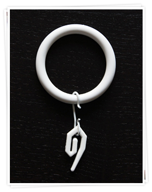 Ring with standard curtain hook for a curtain pole.